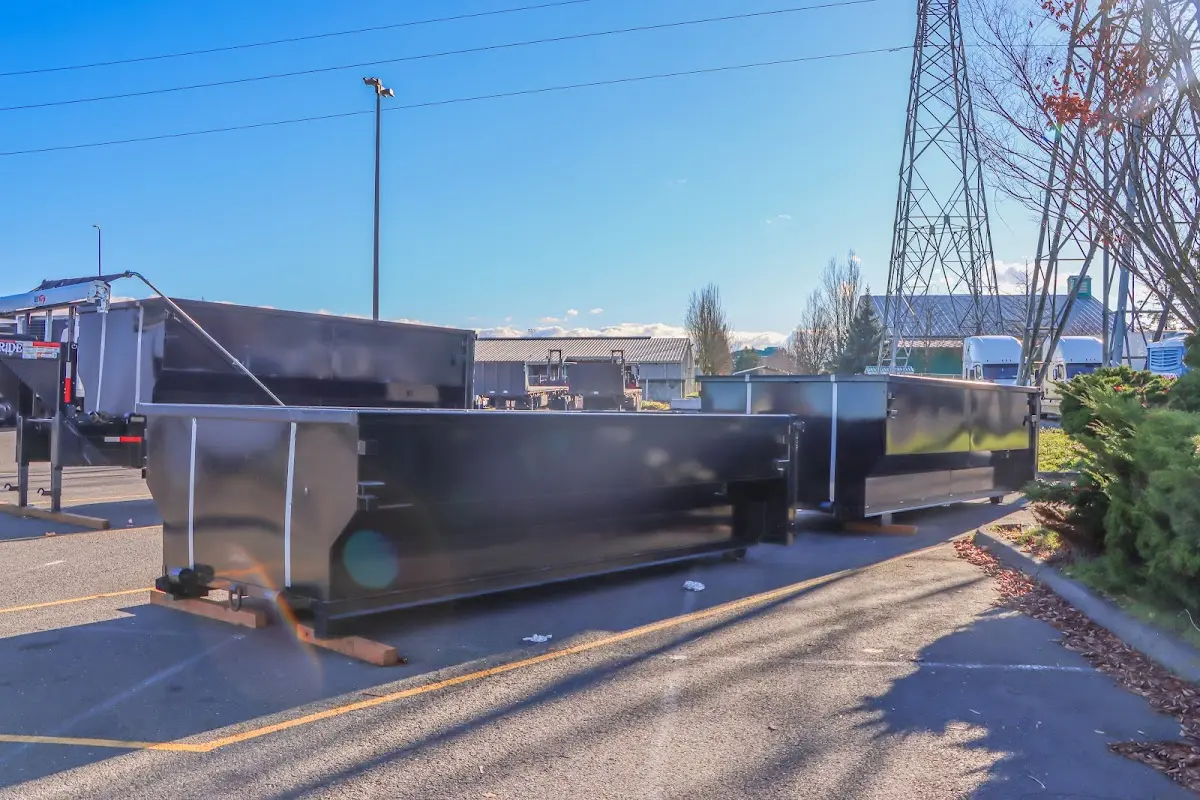 Roll-off dumpster ready for waste disposal at job site for 2 Yard Dumpster Rental in Gallatin